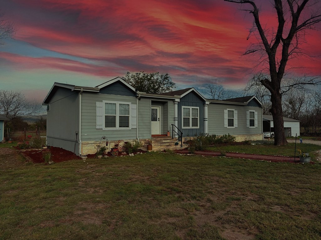 5200 Rr 1120 Rio Frio, TX 78879 - Photo 36 of 39 a front view of a house with a garden