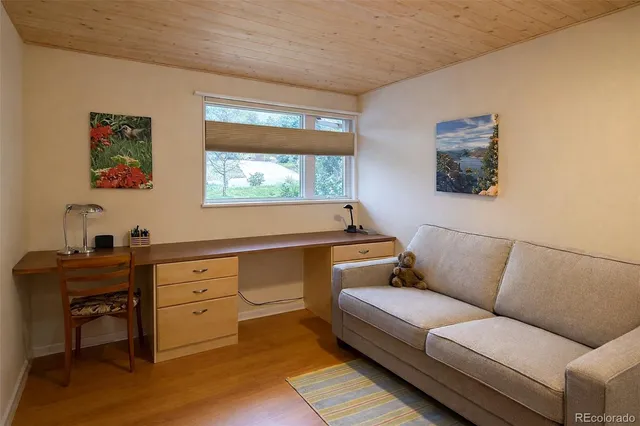 a room with furniture and window