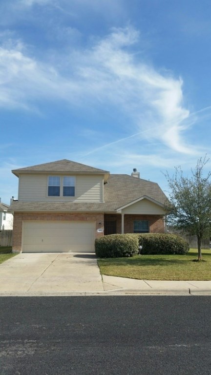 2402 Edgecliff Path Georgetown, TX 78626 - Photo 1 of 1 a front view of a house with a yard