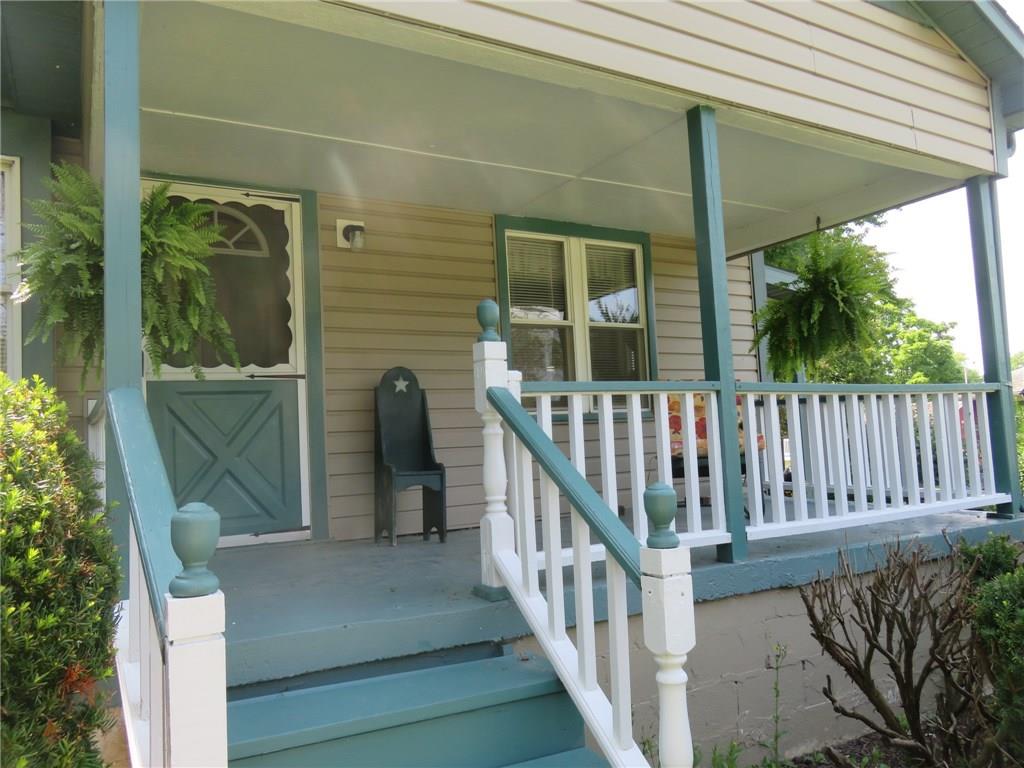 611 New Castle Road Slippery Rock, PA 16057 - Photo 2 of 24 Charming front porch and nicely manicured yard!