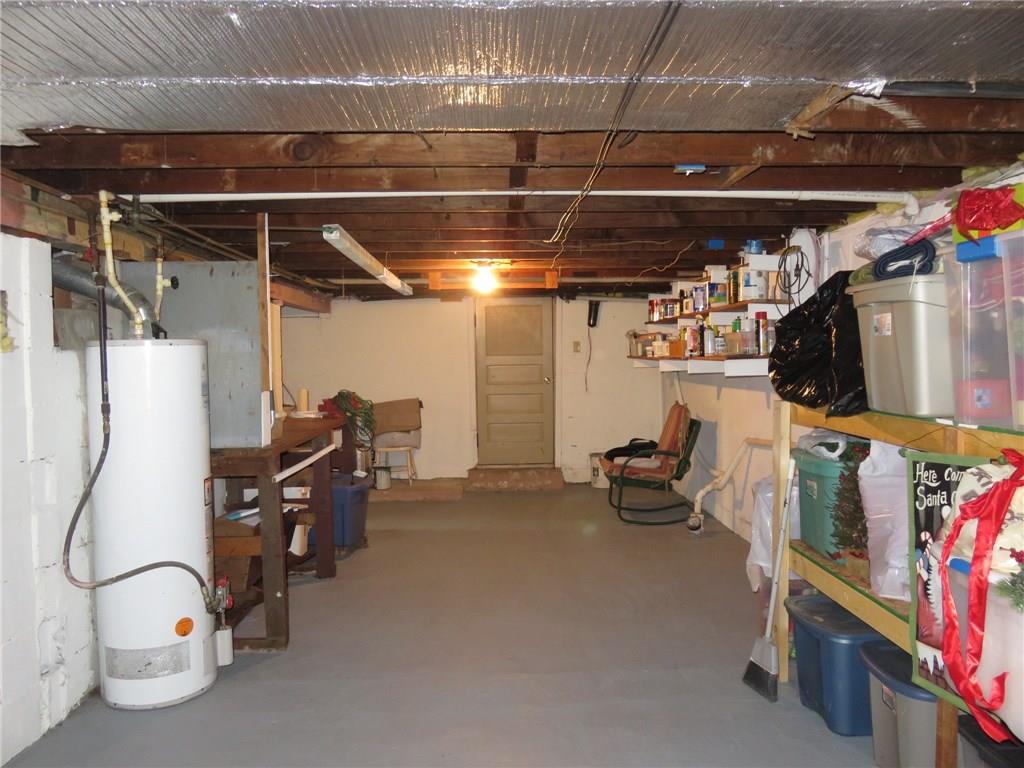 611 New Castle Road Slippery Rock, PA 16057 - Photo 20 of 24 Concrete floors, painted walls and a walk-up exit in the basement.