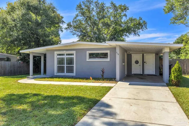 a view of a house with a swimming pool