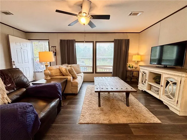 a kitchen with stainless steel appliances granite countertop a stove and a refrigerator