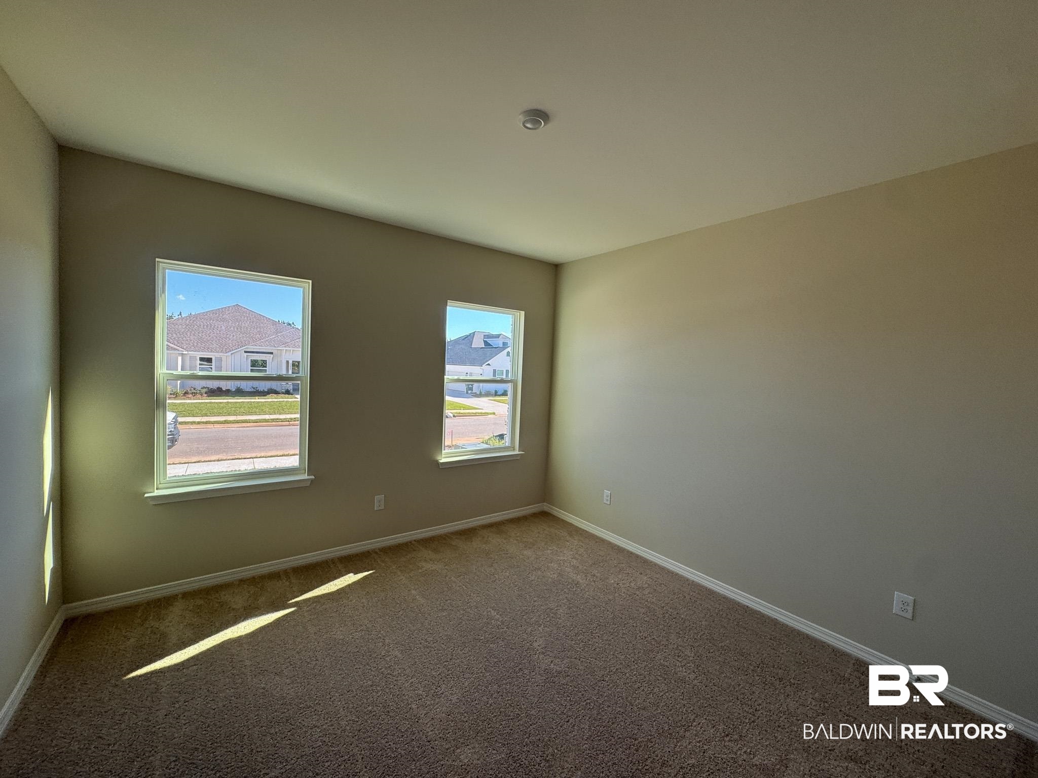 24026 Shadowridge Drive Daphne, AL 36526 - Photo 9 of 11 View of carpeted empty room
