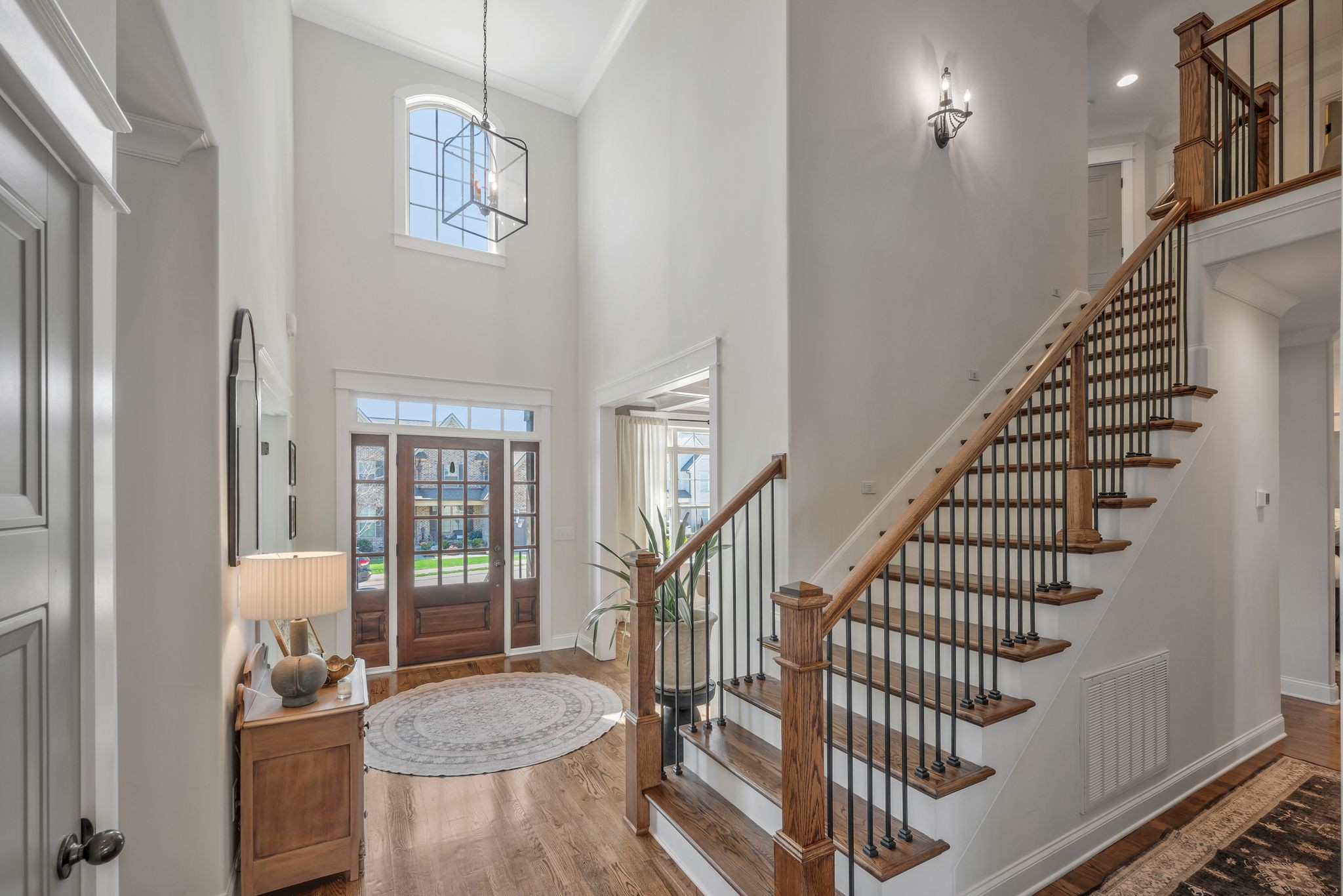 1009 Alpaca Drive Spring Hill, TN 37174 - Photo 11 of 48 a view of entryway and hall with wooden floor