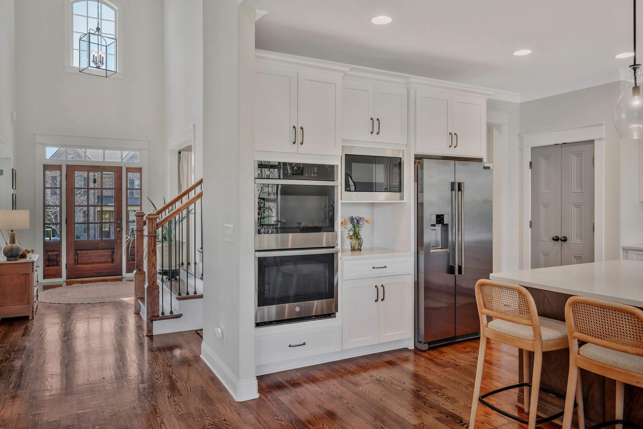 1009 Alpaca Drive Spring Hill, TN 37174 - Photo 18 of 48 a kitchen with stainless steel appliances a refrigerator and a stove top oven