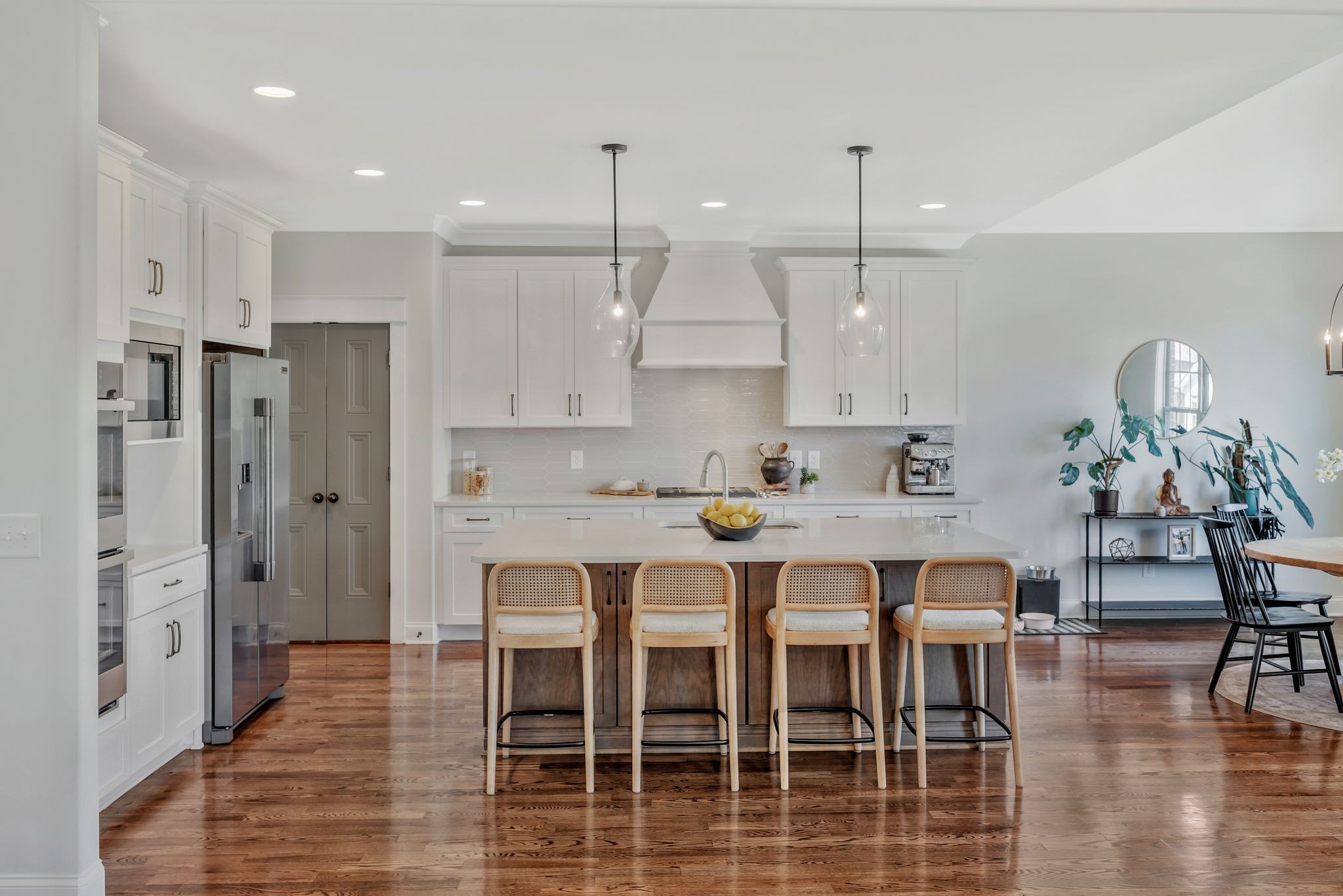 1009 Alpaca Drive Spring Hill, TN 37174 - Photo 19 of 48 a large kitchen with a table and chairs