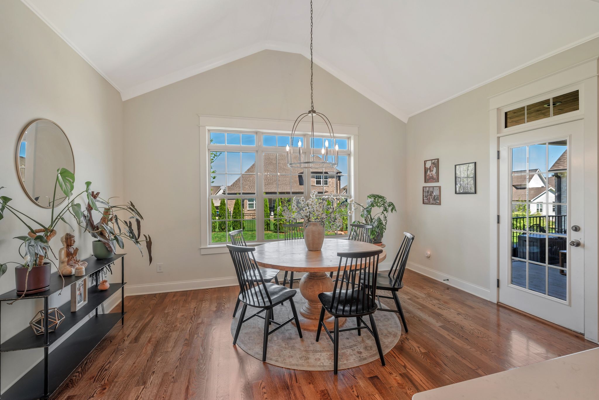 1009 Alpaca Drive Spring Hill, TN 37174 - Photo 22 of 48 a view of a dining room with furniture and wooden floor