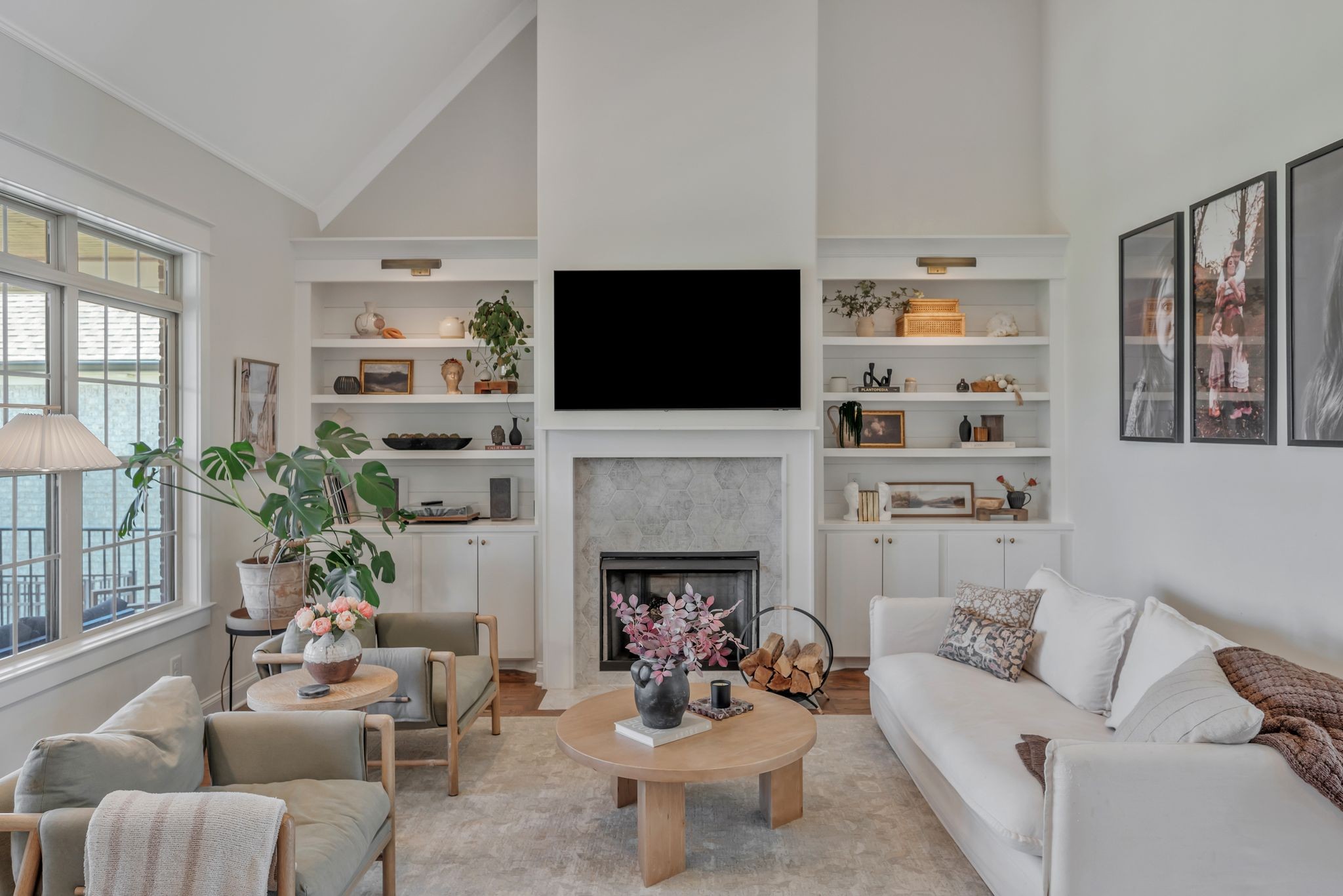 1009 Alpaca Drive Spring Hill, TN 37174 - Photo 26 of 48 a living room with furniture a fireplace and a flat screen tv