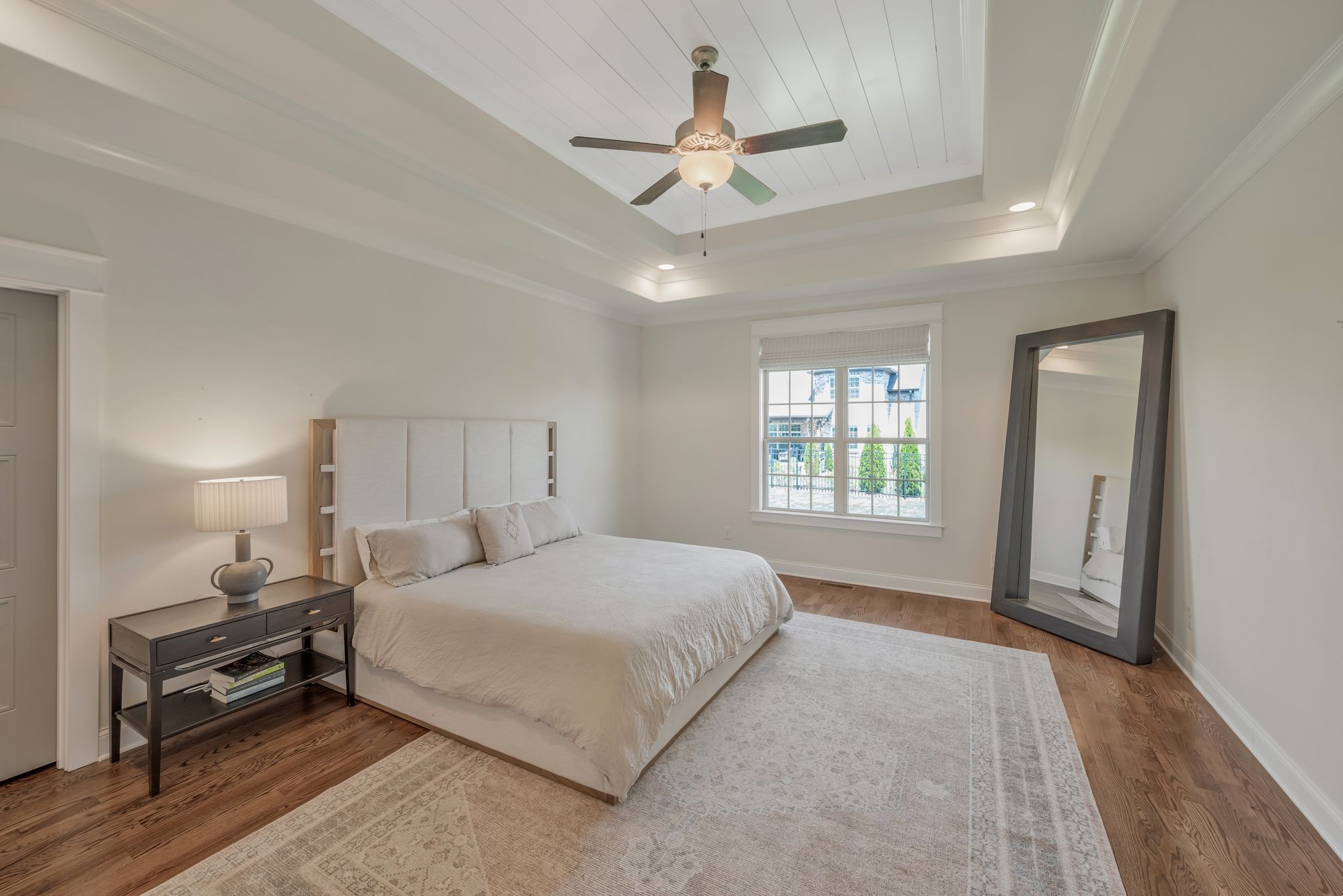 1009 Alpaca Drive Spring Hill, TN 37174 - Photo 29 of 48 a bedroom with a large bed chandelier and a window