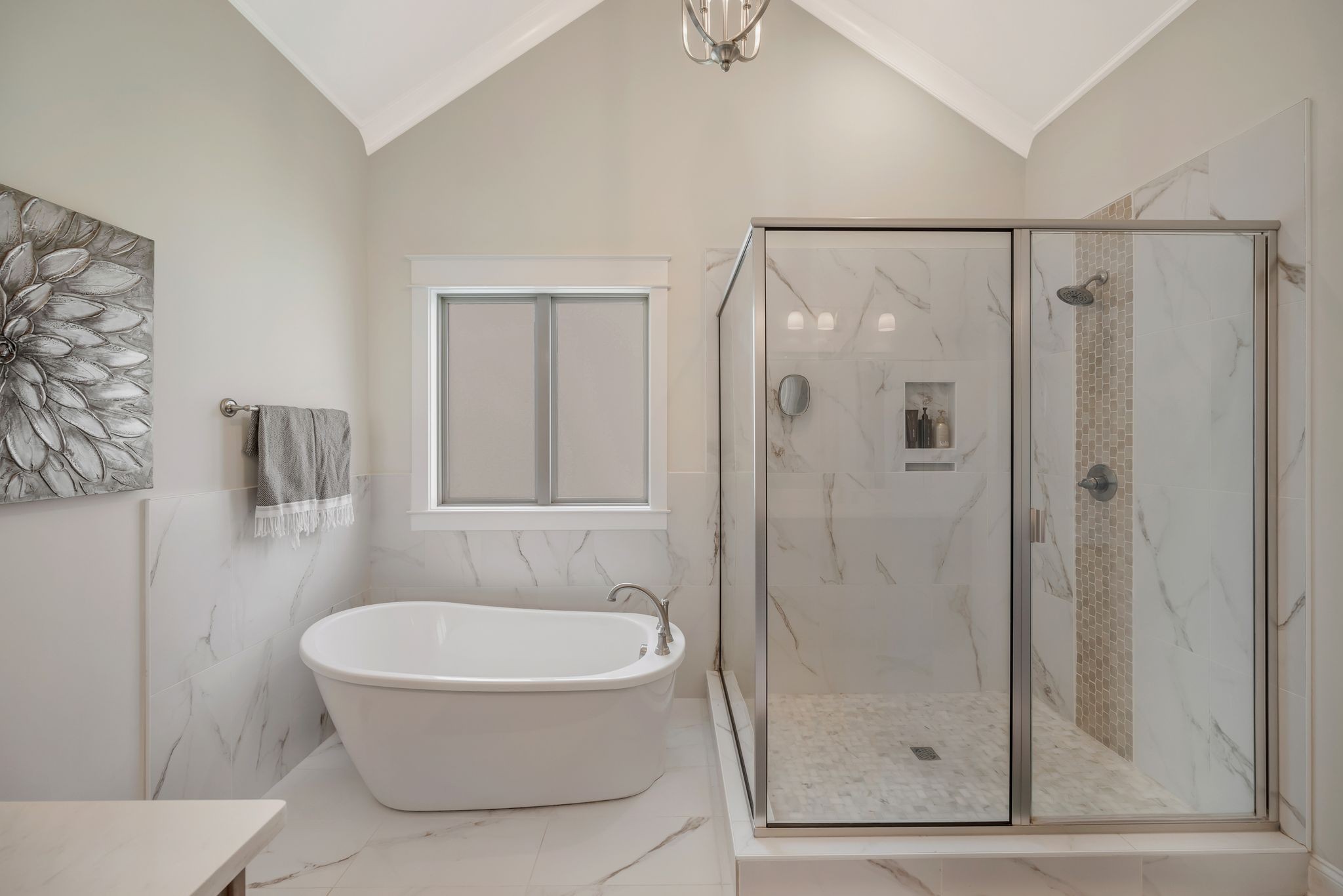 1009 Alpaca Drive Spring Hill, TN 37174 - Photo 33 of 48 a bathroom with a shower and a bathtub