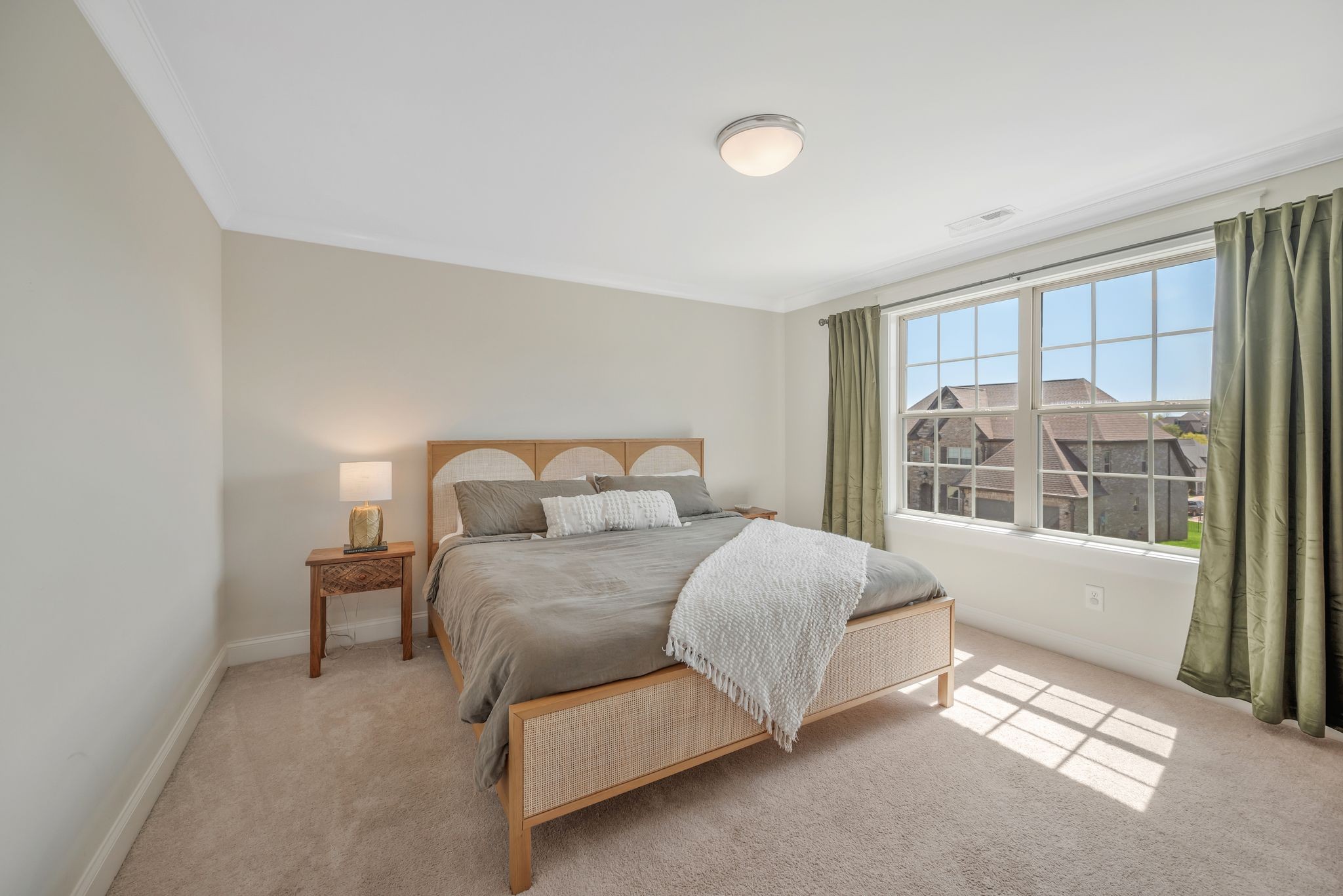 1009 Alpaca Drive Spring Hill, TN 37174 - Photo 39 of 48 a bedroom with a bed and a large window