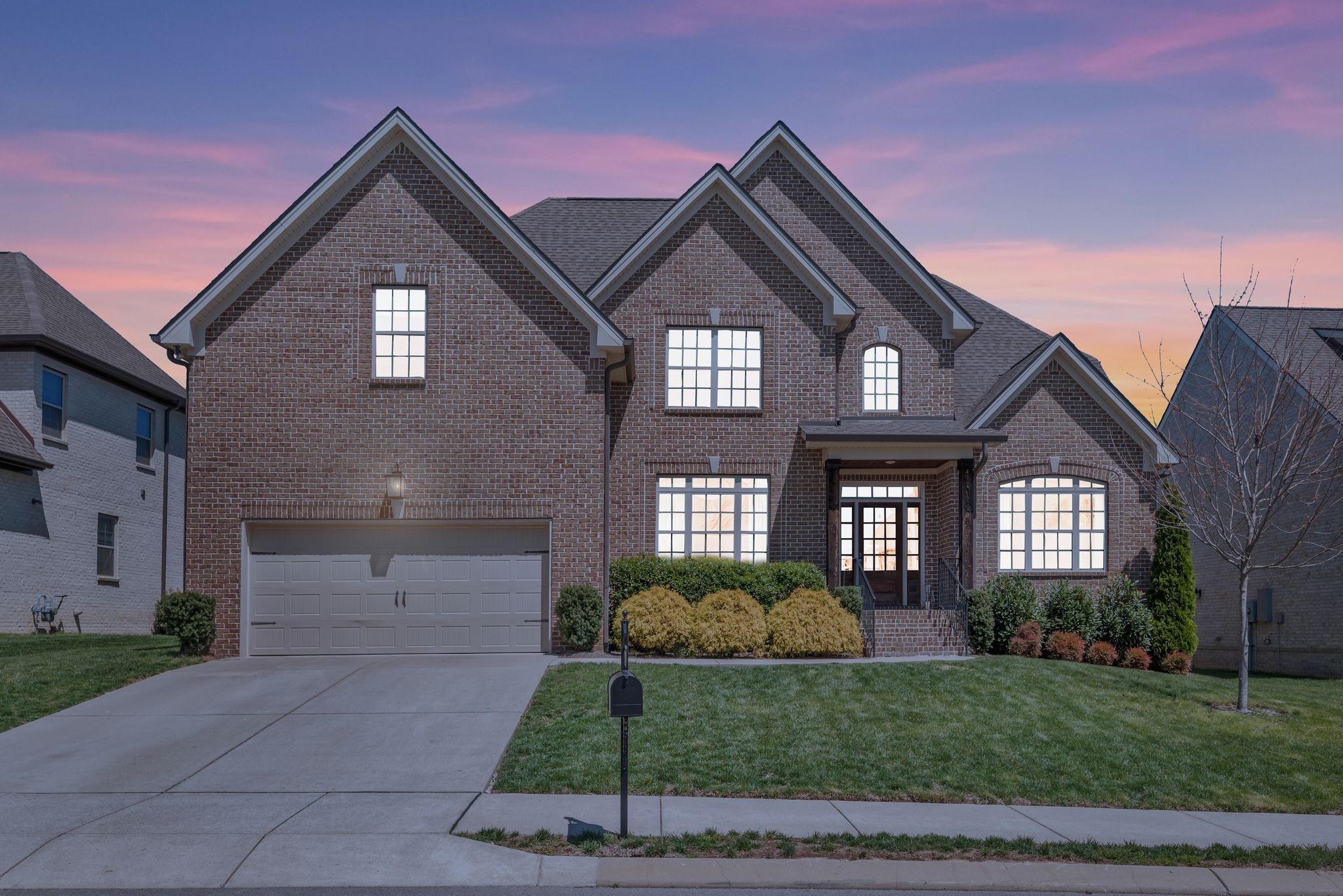 1009 Alpaca Drive Spring Hill, TN 37174 - Photo 6 of 48 a front view of a house with a yard