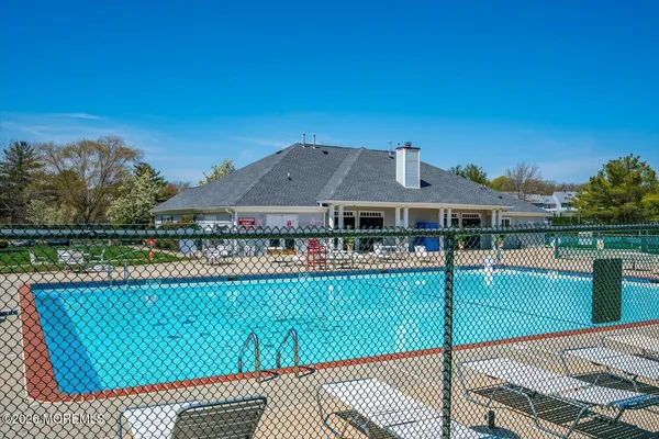 a view of a park with sitting area