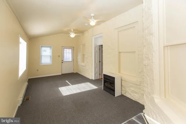 a view of an empty room and window