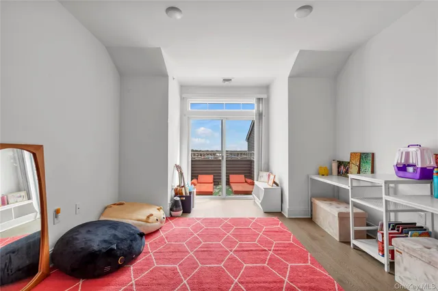 a bedroom with a bed and a table in it