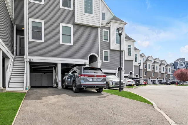 a car parked in front of a house