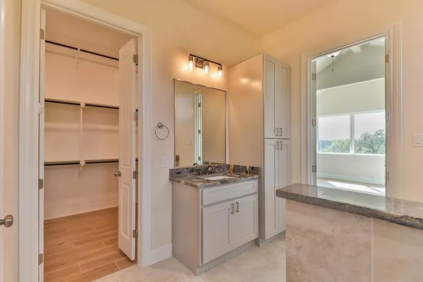 a kitchen with a stove and a refrigerator
