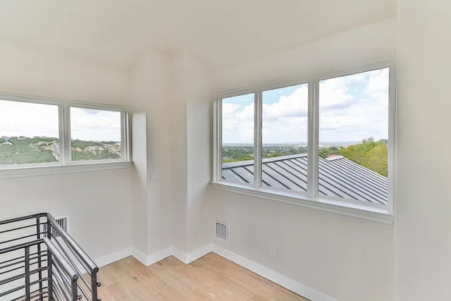 a view of a bedroom with a window