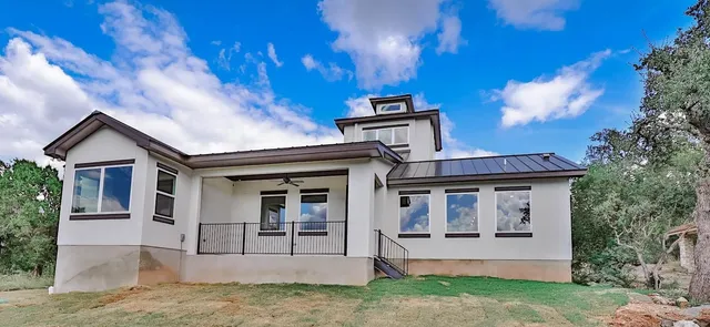 front view of a house with a yard