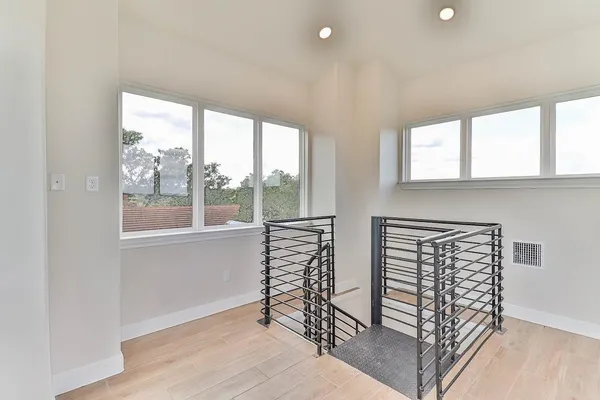 a view of entryway with wooden floor