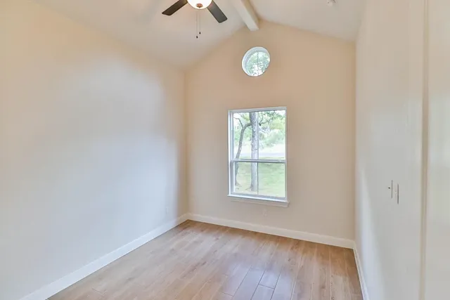 an empty room with window