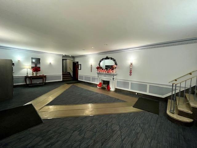 243 78th Street, Unit 6H Brooklyn, NY 11209 - Photo 4 of 19 a living room with furniture and a gym equipment