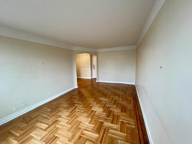 243 78th Street, Unit 6H Brooklyn, NY 11209 - Photo 9 of 19 an empty room with wooden floor