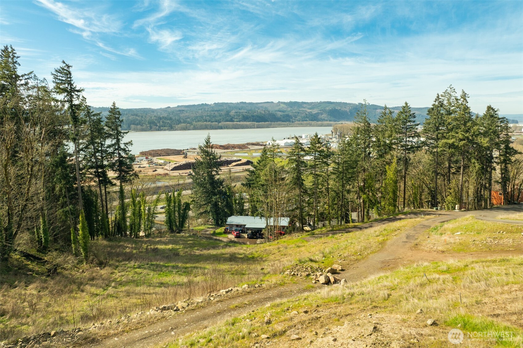 0 Spencer Creek Road, Unit LOT 2 Kalama, WA 98625 - Photo 13 of 30 a view of a swimming pool with an ocean view