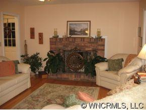 263 Docks Road Hendersonville, NC 28792 - Photo 3 of 12 a living room with furniture and a wooden floor