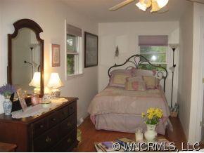 263 Docks Road Hendersonville, NC 28792 - Photo 6 of 12 a bathroom with a sink and two mirror
