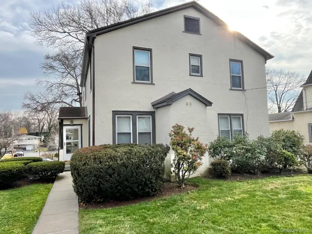 a house view with a garden space