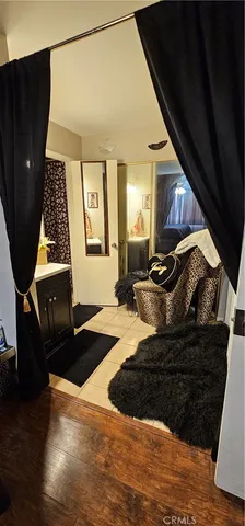 a bathroom with a mirror sink and shower