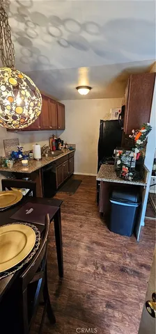 a kitchen with table and chairs