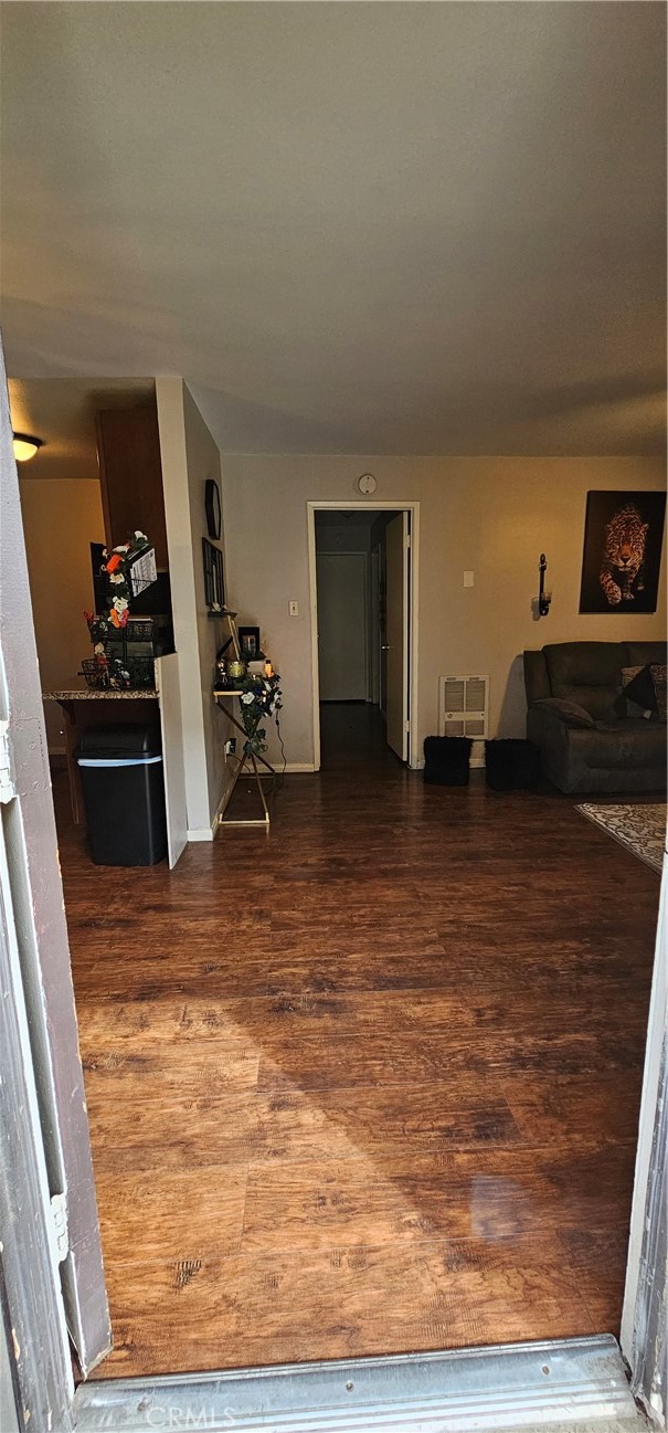 5535 Ackerfield Avenue, Unit 9 Long Beach, CA 90805 - Photo 8 of 19 a view of a livingroom with wooden floor