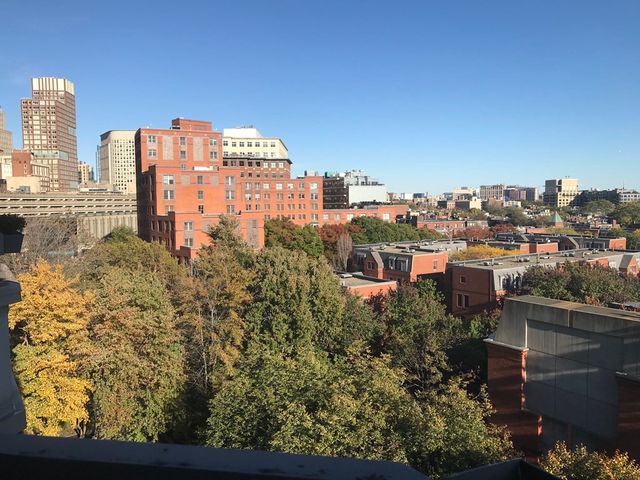a view of a city from a balcony
