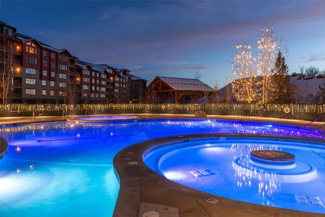 a view of a chairs and table in a patio