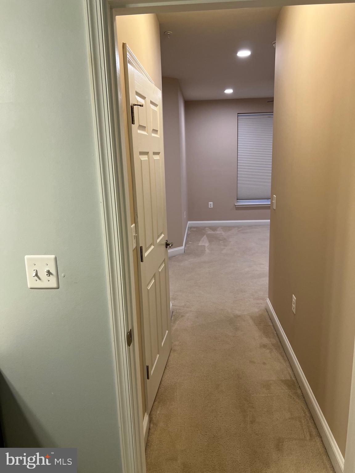 3910 Doc Berlin Drive, Unit 14 Silver Spring, MD 20906 - Photo 13 of 13 view of a hallway with parking space