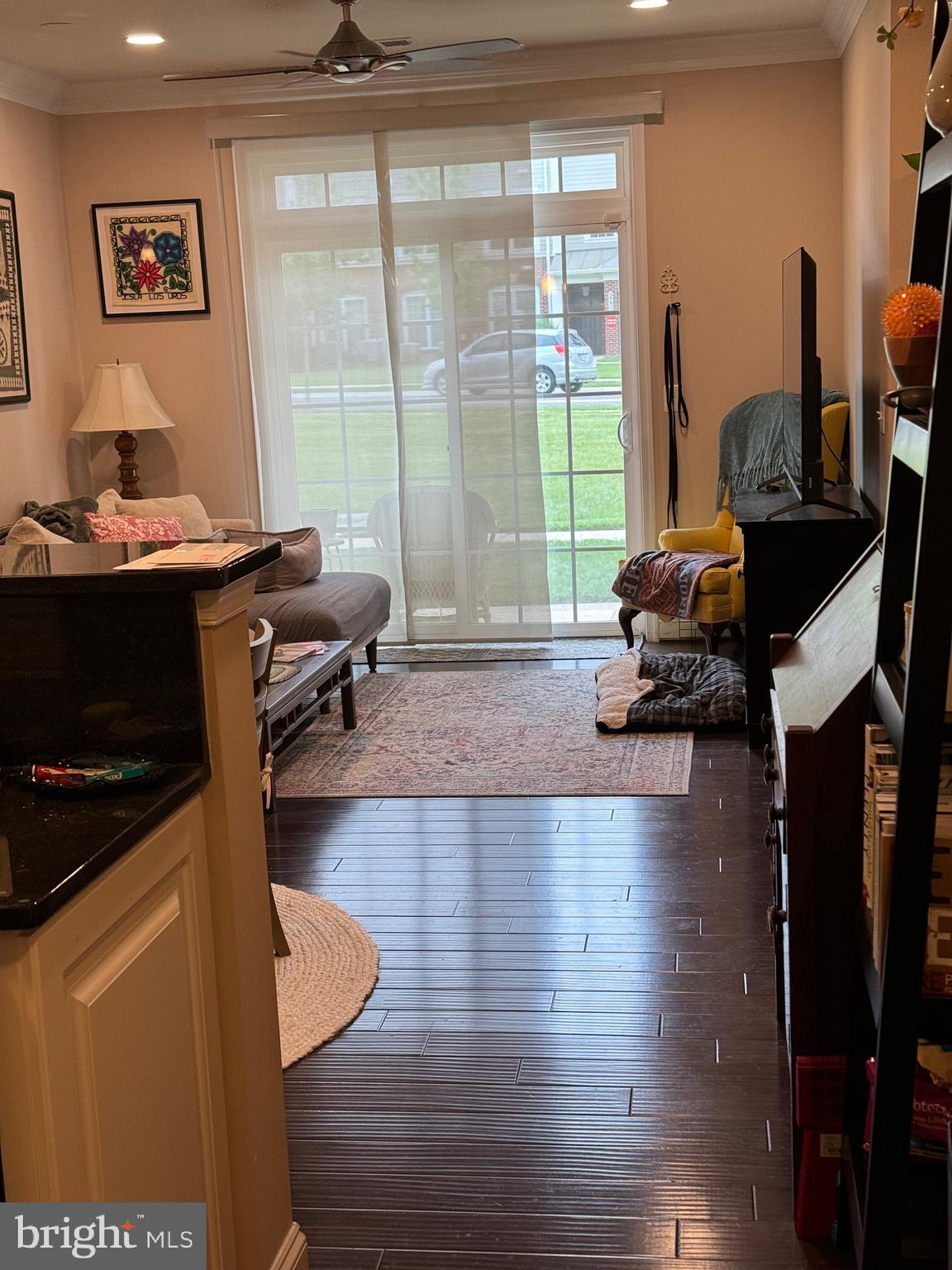 3910 Doc Berlin Drive, Unit 14 Silver Spring, MD 20906 - Photo 2 of 13 a living room with furniture and a window