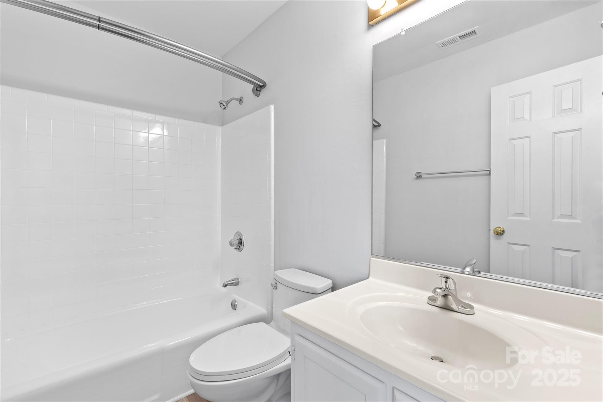 10942 Winterbourne Court Charlotte, NC 28277 - Photo 11 of 27 a bathroom with a sink toilet and shower