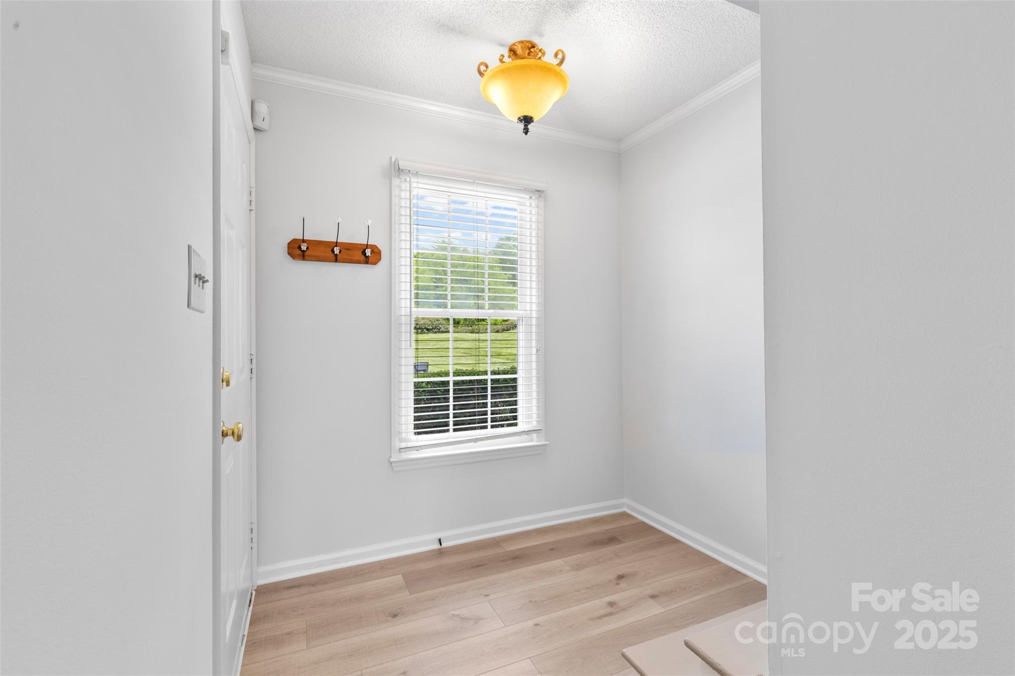 10942 Winterbourne Court Charlotte, NC 28277 - Photo 13 of 27 a view of a storage & utility room with a window