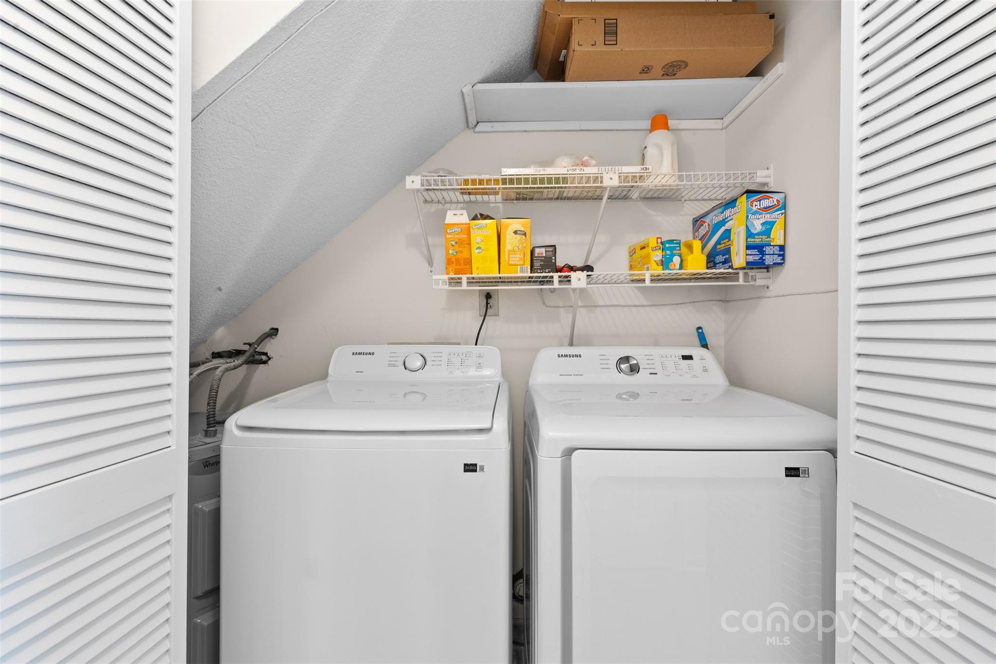 10942 Winterbourne Court Charlotte, NC 28277 - Photo 17 of 27 a utility room with dryer and washer