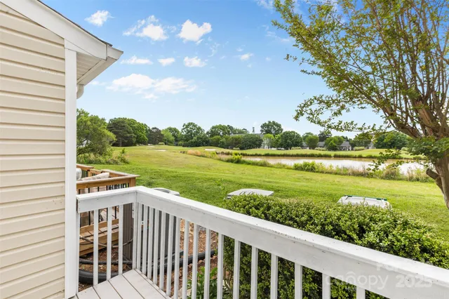 a view of a balcony with lake view