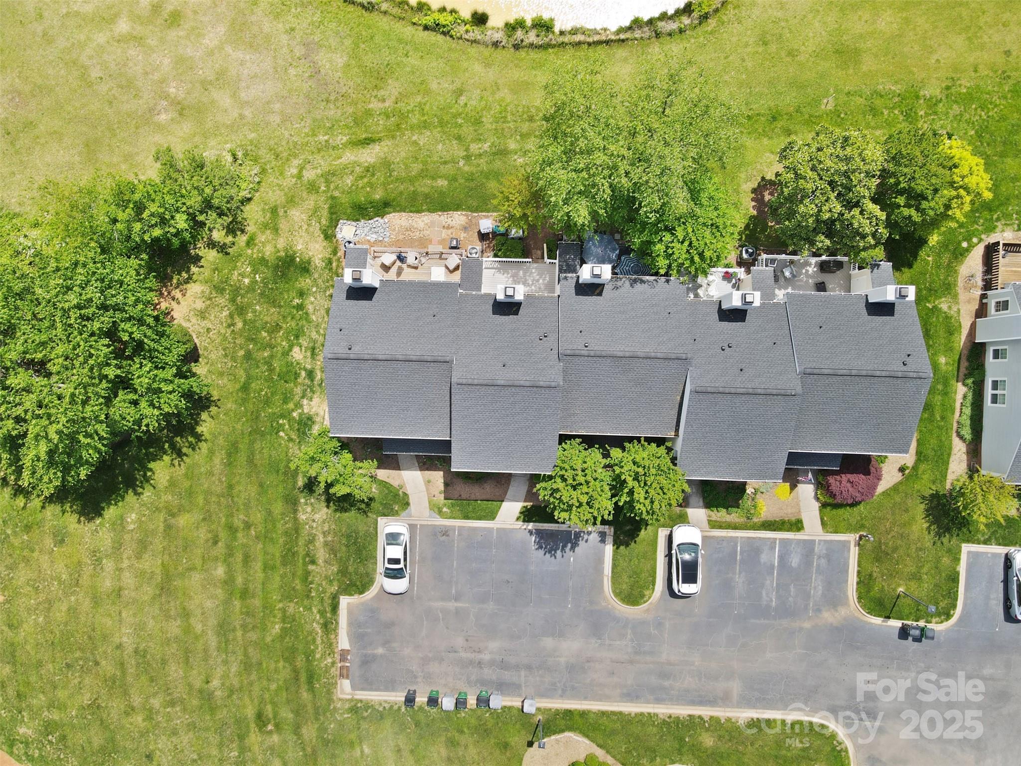 10942 Winterbourne Court Charlotte, NC 28277 - Photo 26 of 27 an aerial view of a house with garden