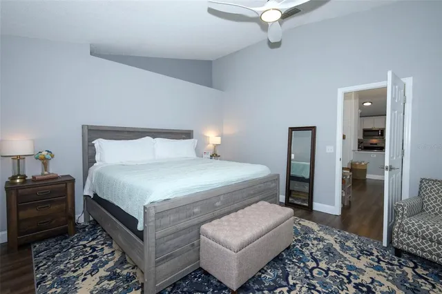 a bedroom with a bed and walk in closet