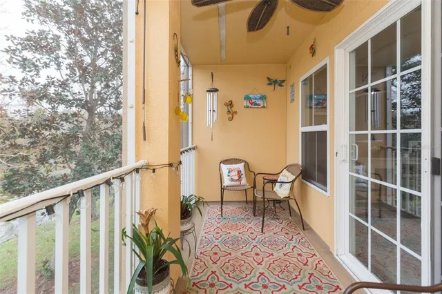 a view of balcony with furniture