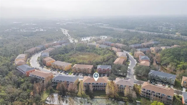 a view of a lake in middle of the town