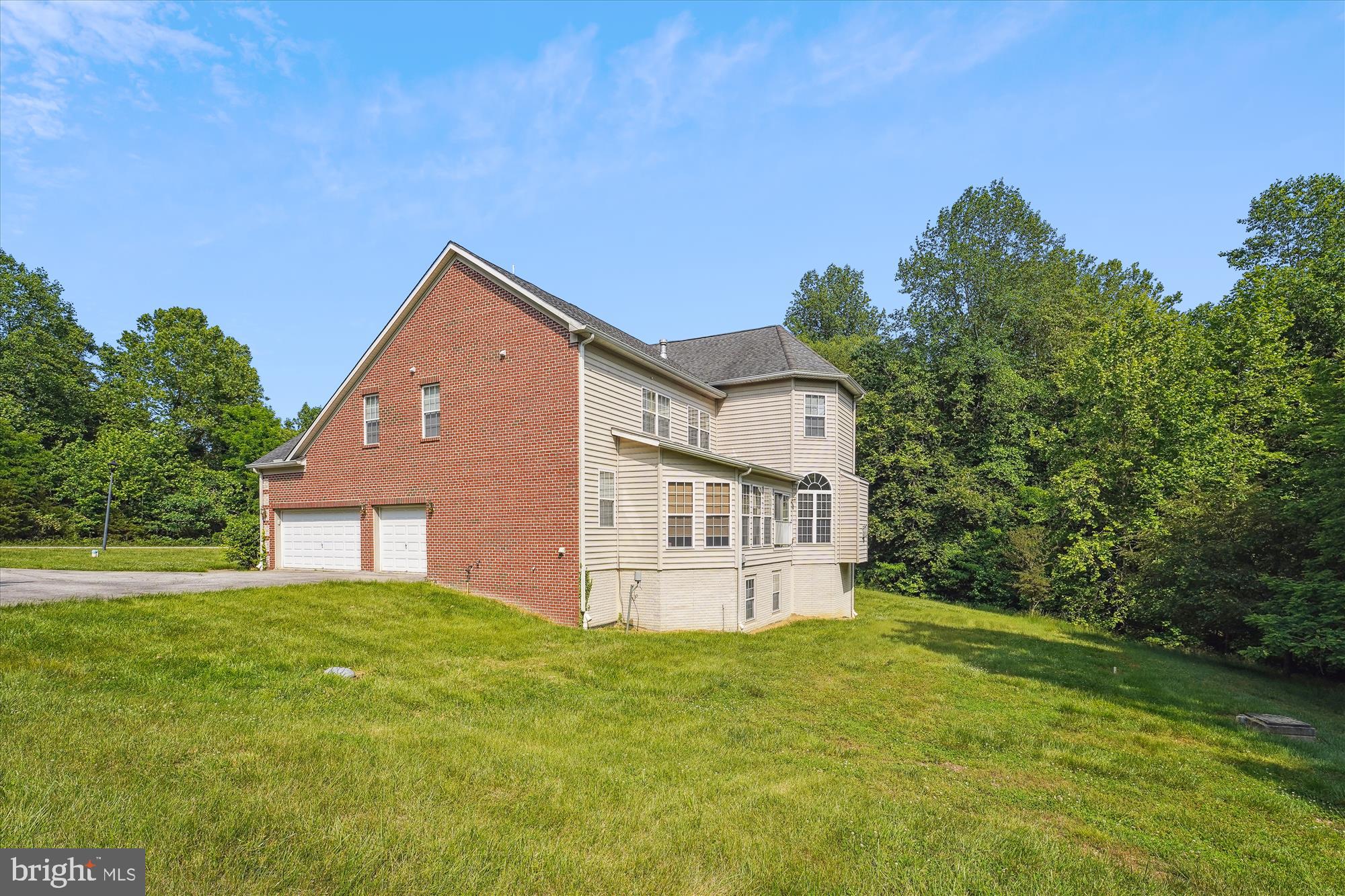 16101 Venice Road Aquasco, MD 20608 - Photo 2 of 40 View from side yard
3 car side-load garage