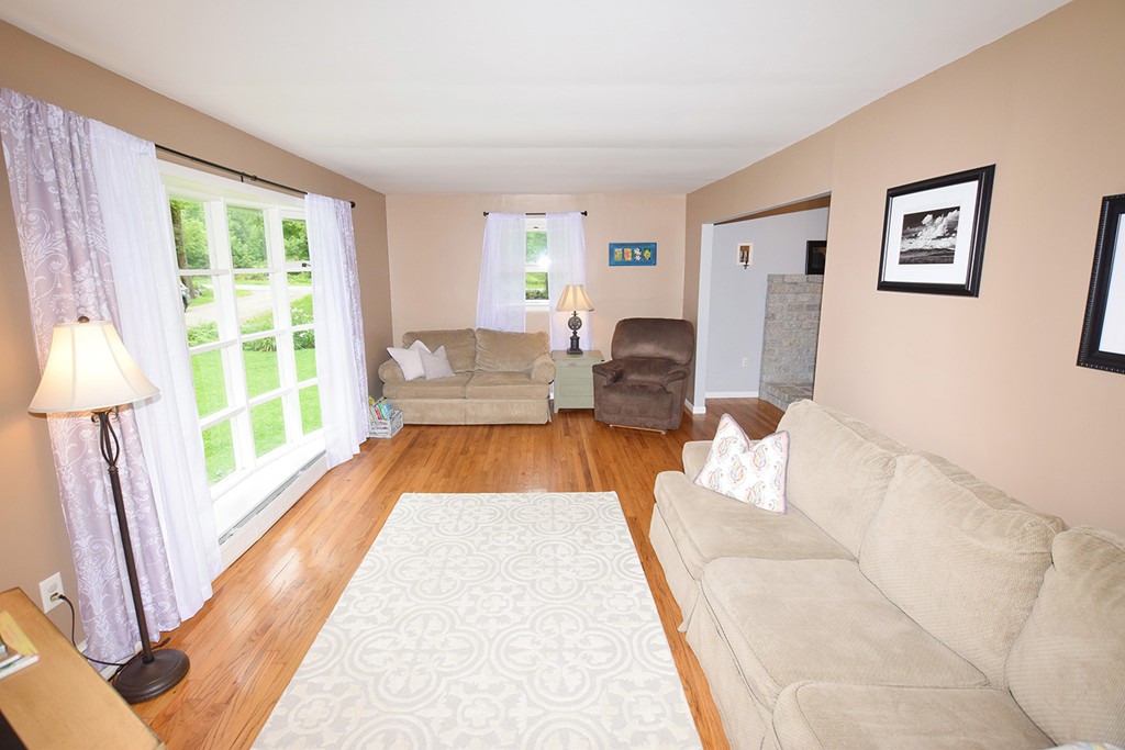 34 Hardwick Road Petersham, MA 01366 - Photo 7 of 24 a living room with furniture and a large window
