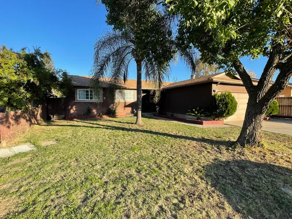 a view of house with yard